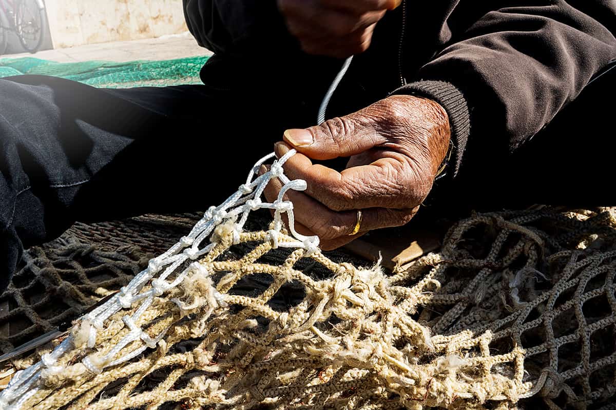 The Village of Weaving Fishing Nets
